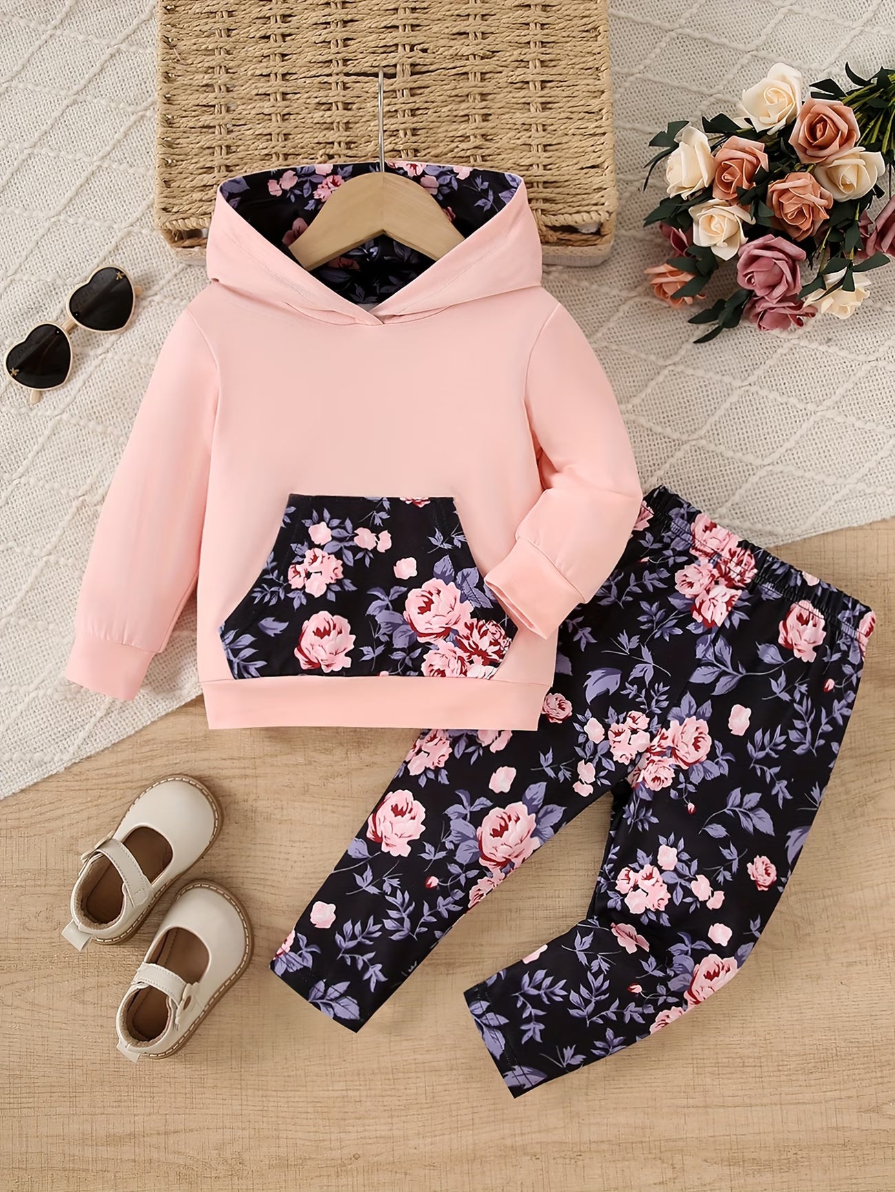 Pink hoodie and floral pants with 