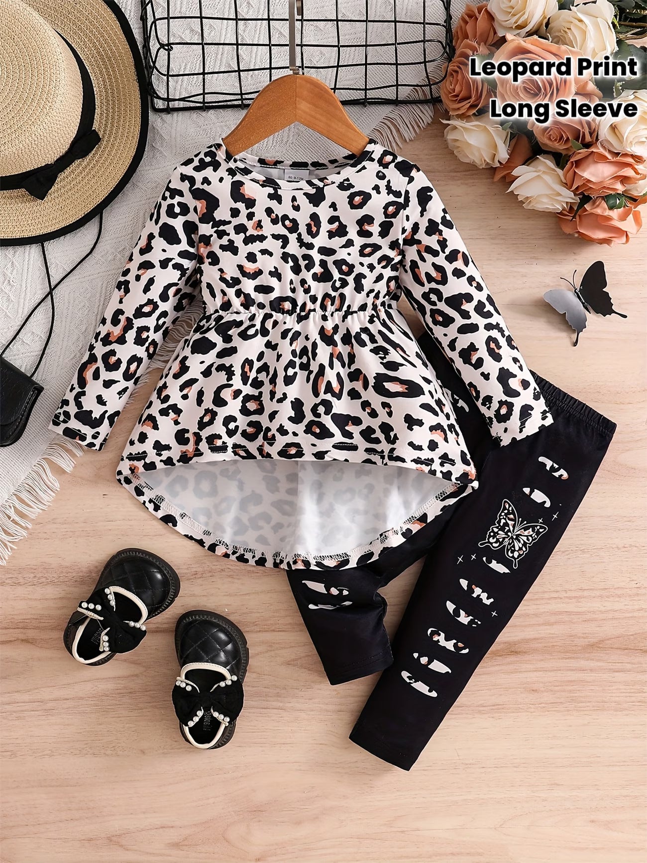 Leopard print long-sleeve top with black pants