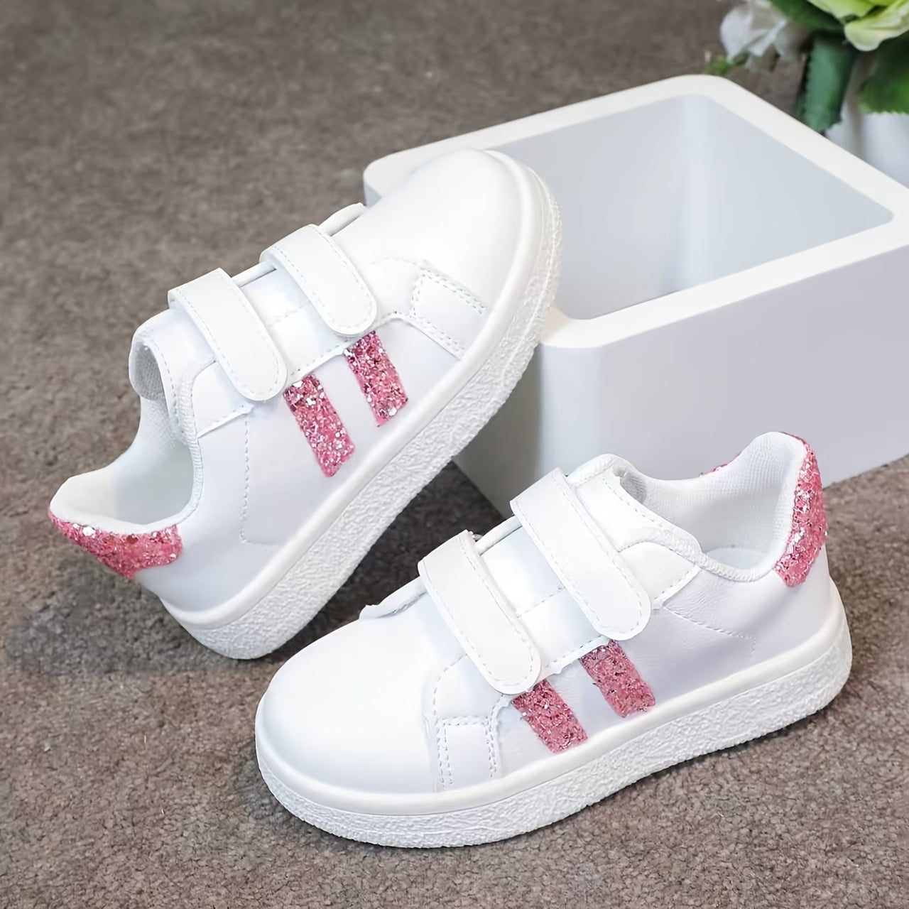 White sneakers with pink glitter stripes 